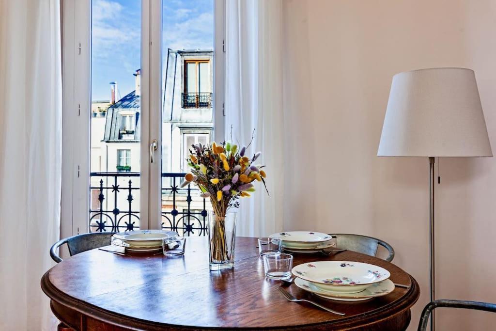 Charmant Appartement Au Coeur De Paris Luaran gambar